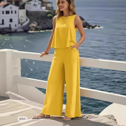🔥Kupi 1, dobij 1 gratis🔥【S-3XL】Ljetni novi modni jednobojni bezrukavni komplet, elegantnog izgleda, idealan za posao i svakodnevno nošenje.