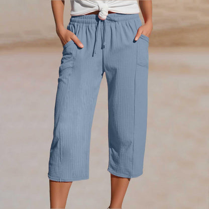 💖【Kupite jedan, dobijte jedan gratis】👖👖Ženske jednobojne plisirane capri hlače od pamuka i lana - hladne i prozračne, laskaju obliku nogu, elegantne i ležerne