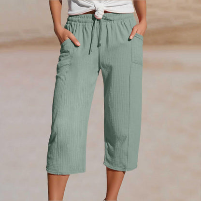 💖【Kupite jedan, dobijte jedan gratis】👖👖Ženske jednobojne plisirane capri hlače od pamuka i lana - hladne i prozračne, laskaju obliku nogu, elegantne i ležerne