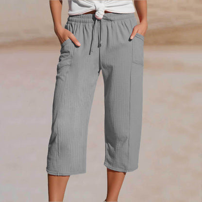 💖【Kupite jedan, dobijte jedan gratis】👖👖Ženske jednobojne plisirane capri hlače od pamuka i lana - hladne i prozračne, laskaju obliku nogu, elegantne i ležerne