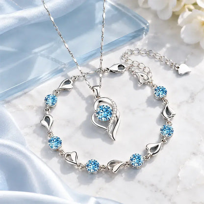 ✨✨Elegantni set ogrlice i narukvice u obliku srca, s blistavim šarenim kristalima, profinjen i lako uklopiv u svaki stil.
